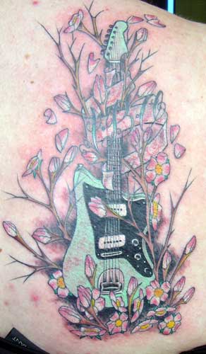 Looking for unique  Tattoos? Cherry Blossom Guitar memorial