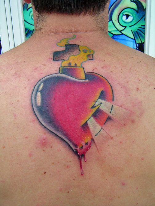 Looking for unique  Tattoos? sacred heart