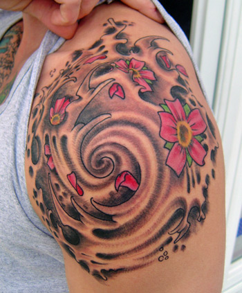 Looking for unique  Tattoos? water tunnel whirlpool with flower