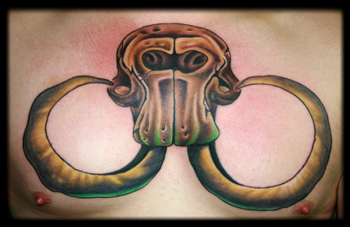 Looking for unique Elmo Tattoos?  Wooly Mammoth Skull Chestpiece