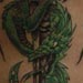 tattoo galleries/ - Dragon with dagger tattoo