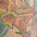 tattoo galleries/ - Dragon in waves tattoo