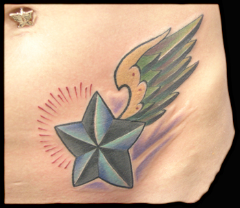 MEMPHIS - star wings tattoo on girls hip