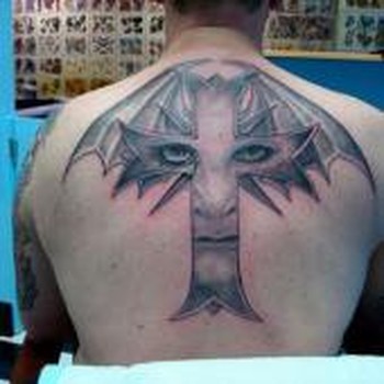 tattoos/ - Face in a cross - 49330