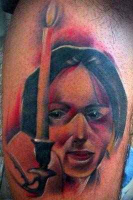Looking for unique  Tattoos? Lady with candle