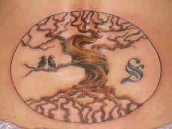 Looking for unique  Tattoos? Symbolic tree tattoo