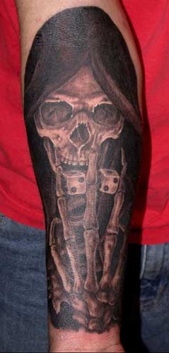 Phil Young - Grim reaper rolling the dice tattoo