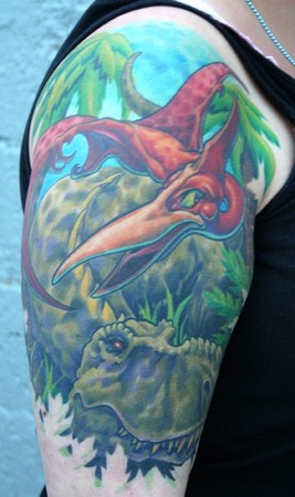 Phil Young - Dinosaur tattoo half sleeve