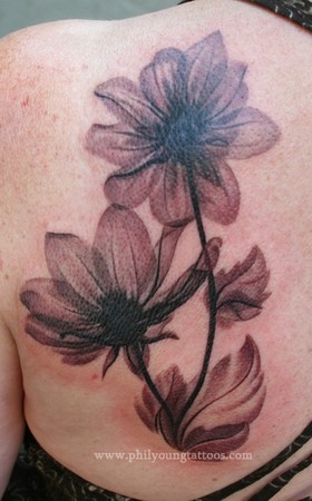 Phil Young - artsy magnolia tattoo