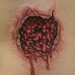 Tattoos - Gun shot wound  - 37430