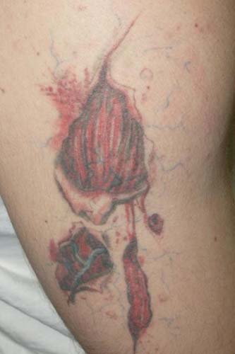 Tattoos Gone Bad - Flower or flesh wound?