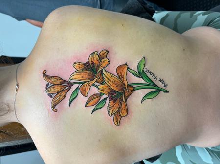 Lettering - Tiger Lillies , her first tattoo