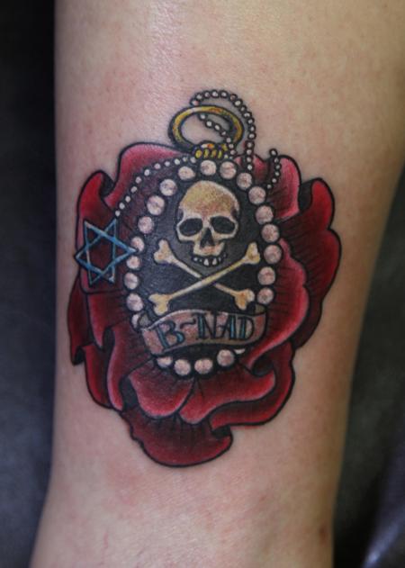 tattoos/ - colored flower with a skull and cross bones tattoo - 64301
