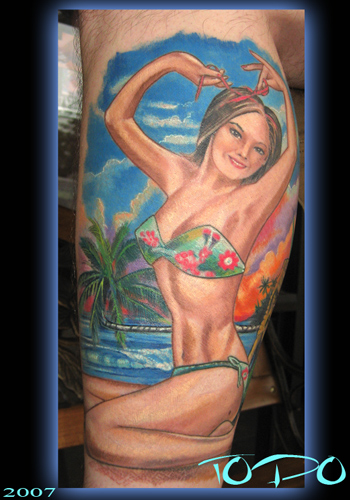 Comments Pinup girl at the beach with a little Tiki