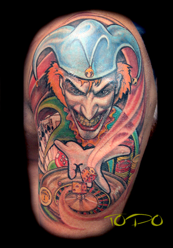 wicked jester tattoos. evil joker tattoo.