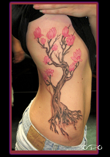 Comments: Ouch.. first tattoo. Todo - Tree on Hip