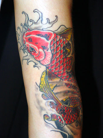 elbow tattoos. Koi on elbow Tattoo Design)