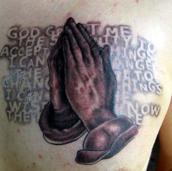 An awesome neck tattoo of the praying hands. Tattoo Picture #3517