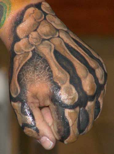 Tattoo Galleries: bone hand Tattoo Design