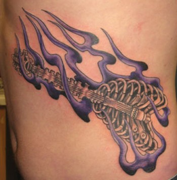 Tattoos flaming guitar
