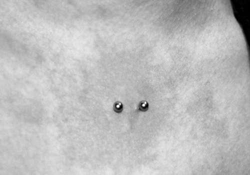 Looking for unique Body Piercing? Surface Piercing on Chest