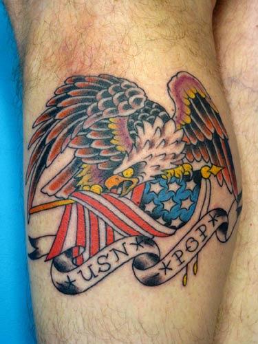 eagle feather tattoo. eagle feather tattooed