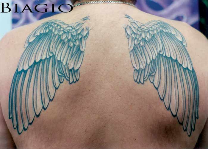 Tattoos Of Wings On The Back. ack wings tattoos