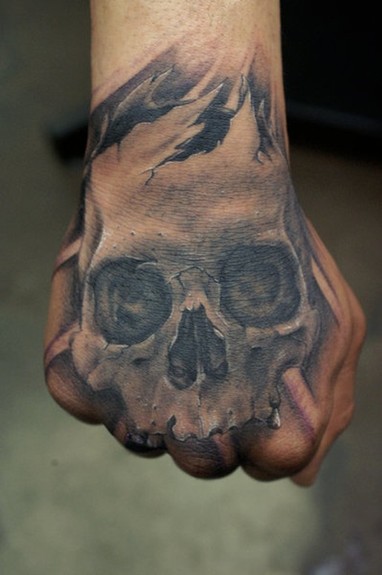 skull tattoos on hands. skull hand tattoo