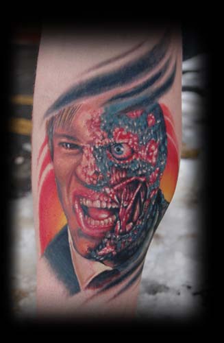 joker face tattoos. Carlos Lopez - Two face