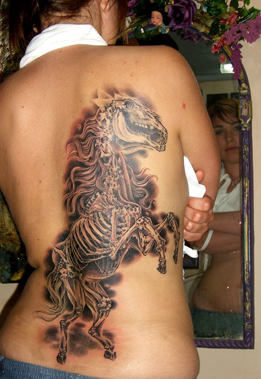 Her first tattoo; Go big or GO HOME!! Chris Dingwell - HORSE SKELETON!