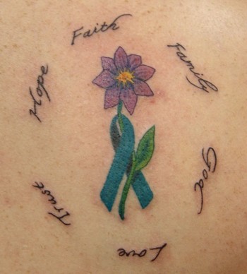 Purple flower and cancer ribbon tattoo 