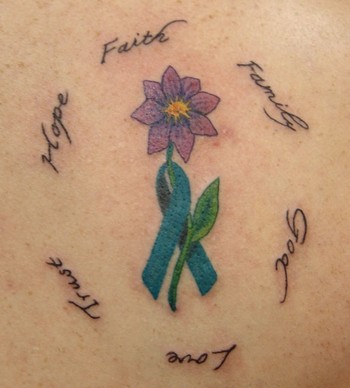 Purple flower and cancer ribbon tattoo