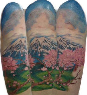 Comments: Color tattoo on bicep, Mt. Fuji landscape with pink cherry blossom 