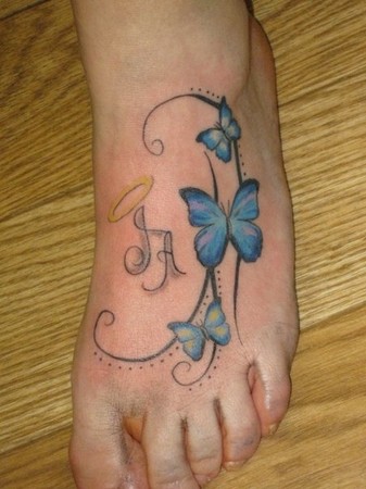 Tattoos. Tattoos Custom. Memorial Initials and Butterflies on a Foot