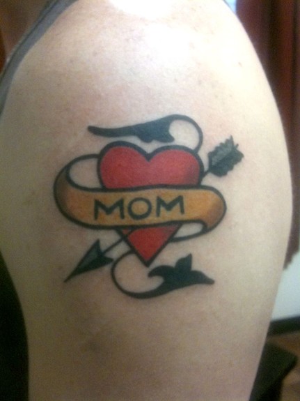 Comments: Traditional Sailor Jerry heart and scroll with Mom tattooed on 