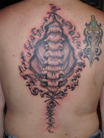 Star Tattoos Down Spine. flower tattoos on spine.