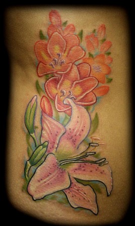 flower tattoo ribs
