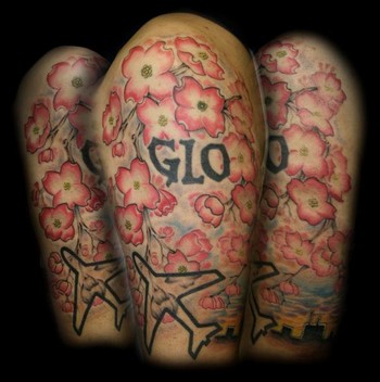 Tattoos Half-Sleeve. Flowers, Airplane and Initials Tattoo