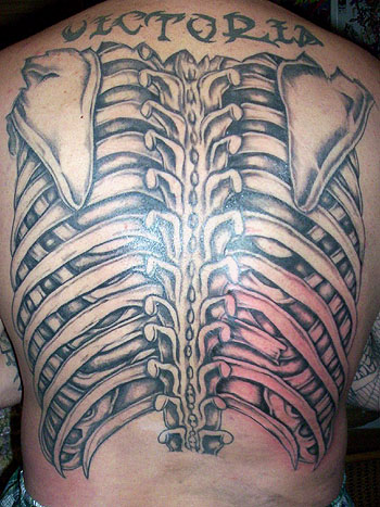 Tattoos · Hellkey. Ribcage Back Piece