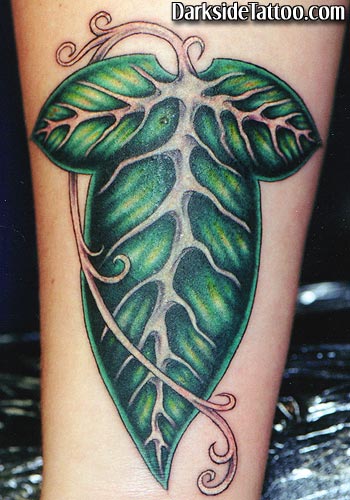 Four Leaf Clover Tattoos Behind Ear. Four leaf clovers as a lucky