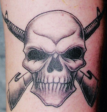 Sean Ohara - Skull and guns. Tattoos