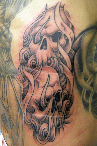 flaming tattoos. Skull on flame tattoo.