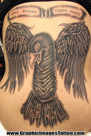 tattoos of ravens. Raven's tribal sleeve and hand tattoos.