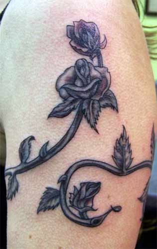 I have a fasination about black roses I have never seen a tattoo like this