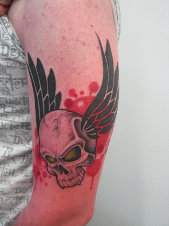 Looking for unique Tattoos? Custom flying skull tattoo