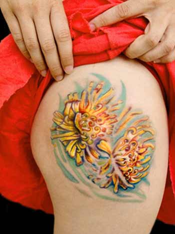water lily tattoo. In general, flower tattoos have a connection with nature,