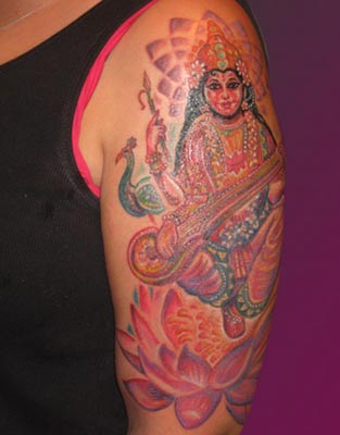 Removal Hindu OM TATTOOS Images A colorful tree tattoo denoting the symbol 