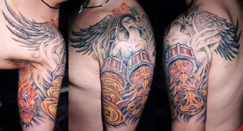 Tattoos · Guy Aitchison. Angel Drums. Now viewing image 0 of 100 previous 