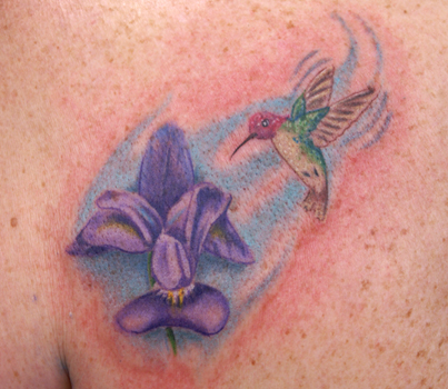 small bird tattoo. Off the Map Tattoo
