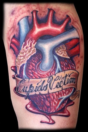 celtic heart tattoo. Celtic heart tattoo on left
